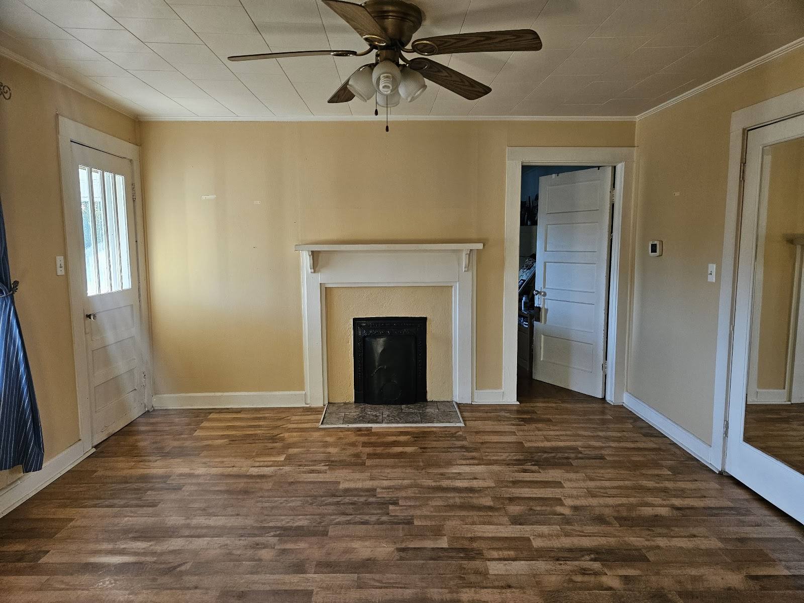 Room with the old wood-look floor before replacement